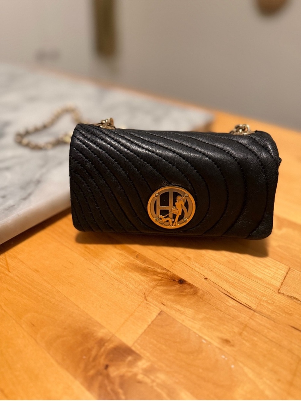 henri bendel Black Quilted Crossbody with Gold Logo